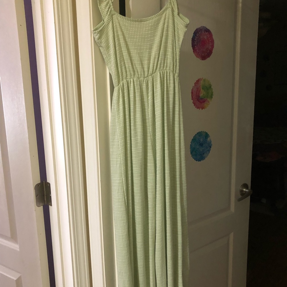 Green and white sleeveless jumpsuit for woman